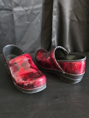 Dansko Women’s Red Patent Leather Clogs with Black Sole